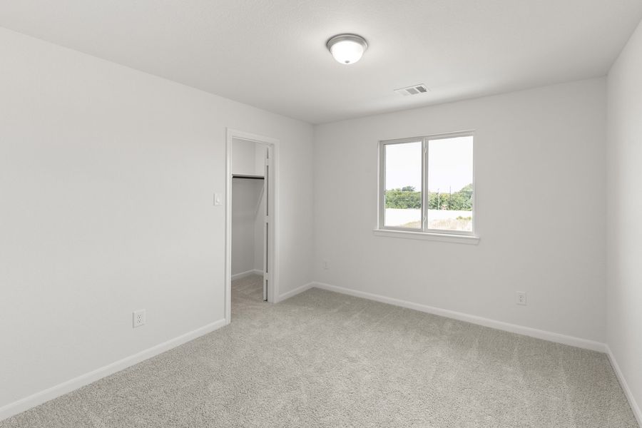 Spacious, unfurnished interior of a new home in The Reserve at Spiritas Ranch, Little Elm (Image 30).