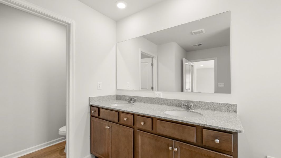 Representative furnished interior of a home built from the Green by D.R. Horton in Fairway 17 at Mirror Lake, Villa Rica (Image 13).