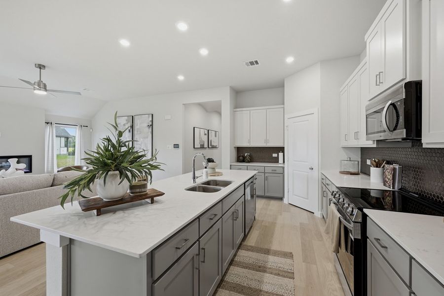 Representative furnished interior of a home built from the The Albany by Lillian Custom Homes in Tabor Ranch, Ponder (Image 15).
