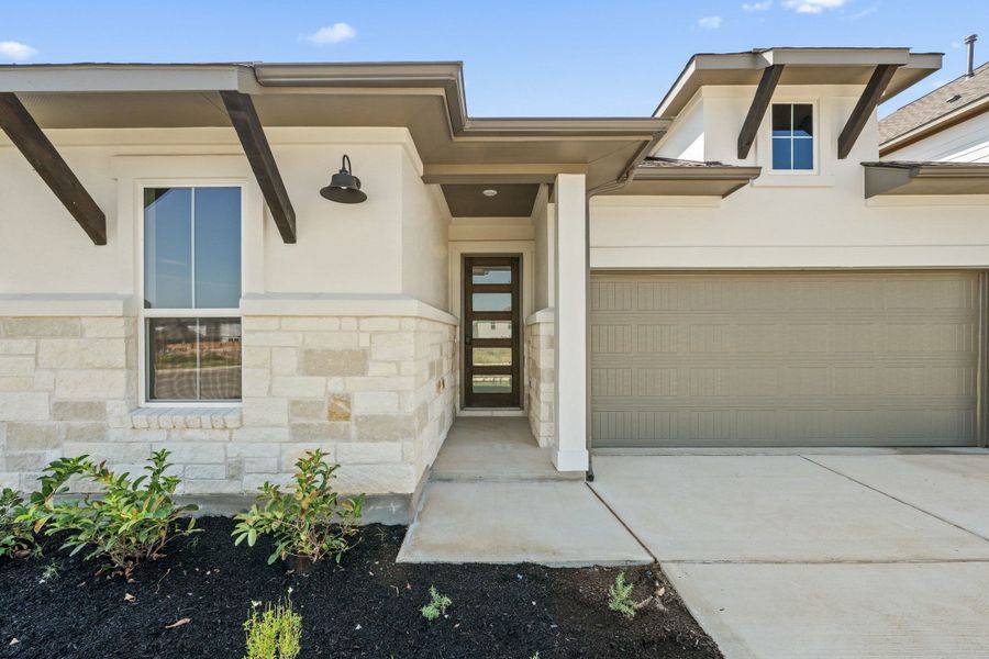 Exterior details and patio area of a home in Lariat, Liberty Hill (Image 3). Exterior details and patio area of a home in Lariat, Liberty Hill (Image 3).
