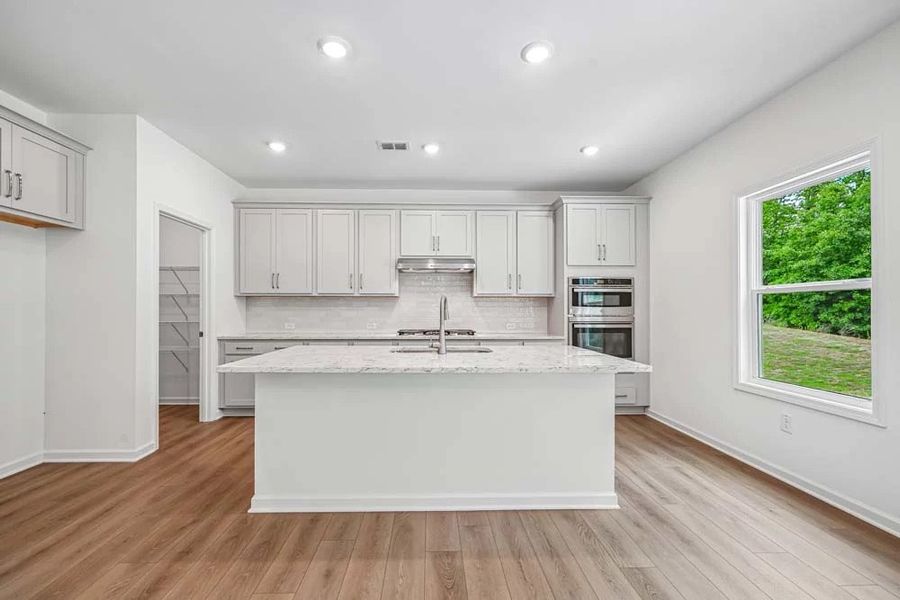 Representative Photo: Kitchen featuring Milan Collection Finishes