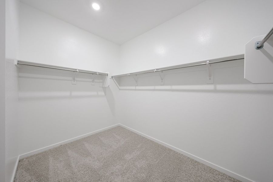 A white wall with a light on it.