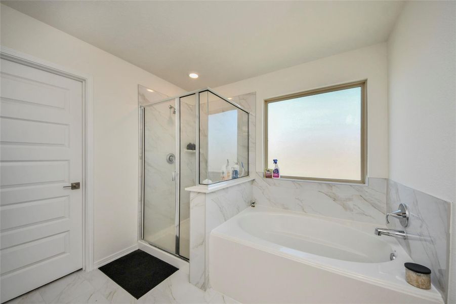 Furnished interior view inside a new home in Sunterra North, Katy (Image 10).