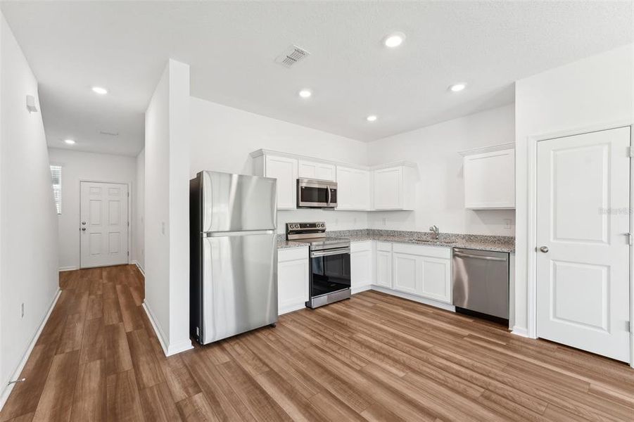 Furnished interior view inside a new home in Vista Walk, Dade City (Image 6).
