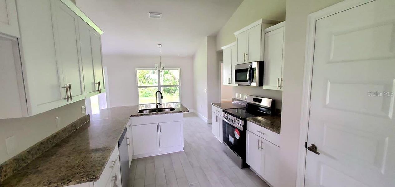 Furnished interior view inside a new home in Port Charlotte, Port Charlotte (Image 3). Furnished interior view inside a new home in Port Charlotte, Port Charlotte (Image 3).