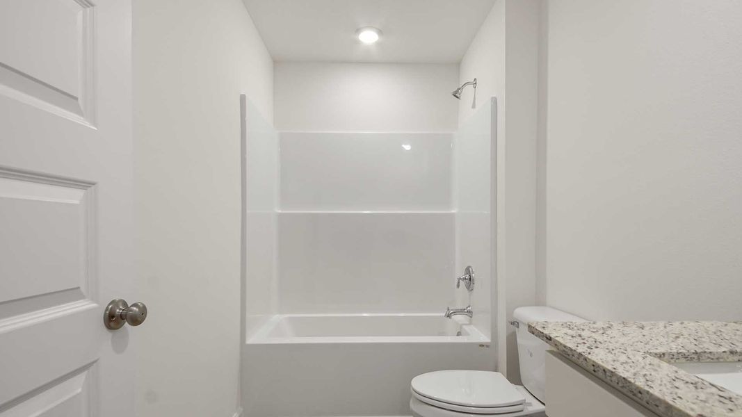 Furnished interior view inside a new home in Ashton Park Phase III, Freeport (Image 12).