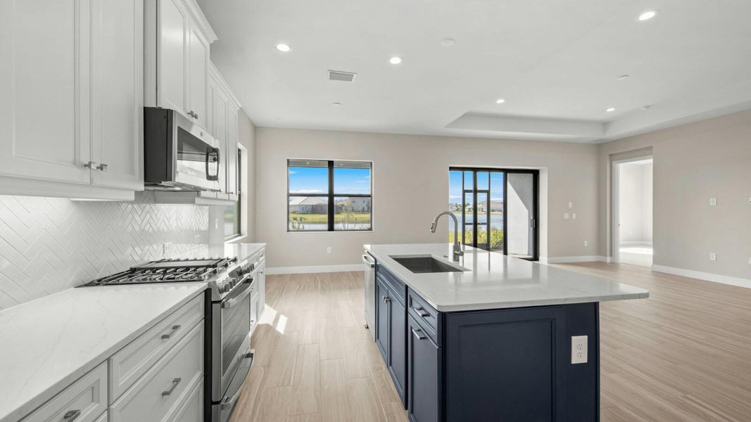 Furnished interior view inside a new home in SkySail Real Estate and Homes for Sale in Naples, FL - Neal Communities, Naples (Image 5).