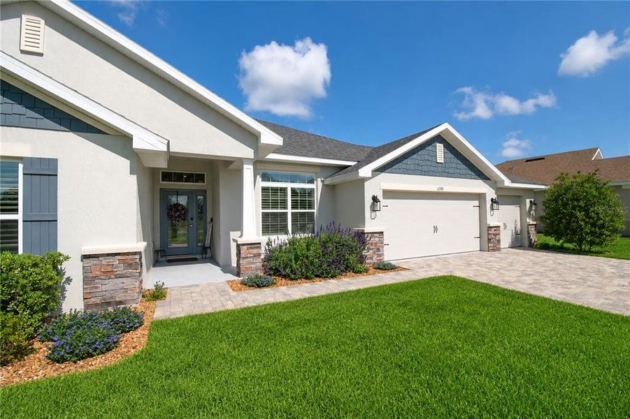 Front exterior of a new home in , Dunnellon, FL, highlighting curb appeal (Image 25).