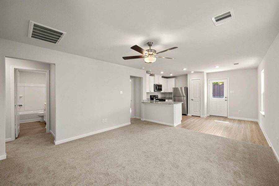 Spacious, unfurnished interior of a new home in Vacek Country Meadows, Richmond (Image 12).