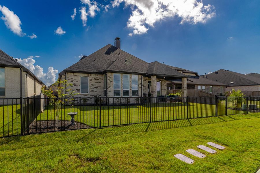 Front exterior of a new home in Cross Creek West, Fulshear, TX, highlighting curb appeal (Image 2).