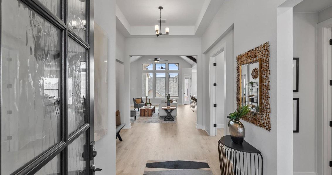 Representative furnished interior of a home built from the Bryant by Chesmar Homes in Sunfield, Buda (Image 3).