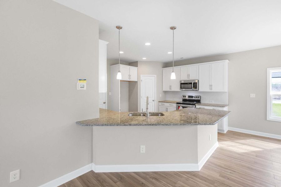 Representative furnished interior of a home built from the Springfield by Caviness & Cates Communities in Sutherland Station at Olde Liberty, Franklinton (Image 93). Representative furnished interior of a home built from the Springfield by Caviness & Cates Communities in Sutherland Station at Olde Liberty, Franklinton (Image 93).