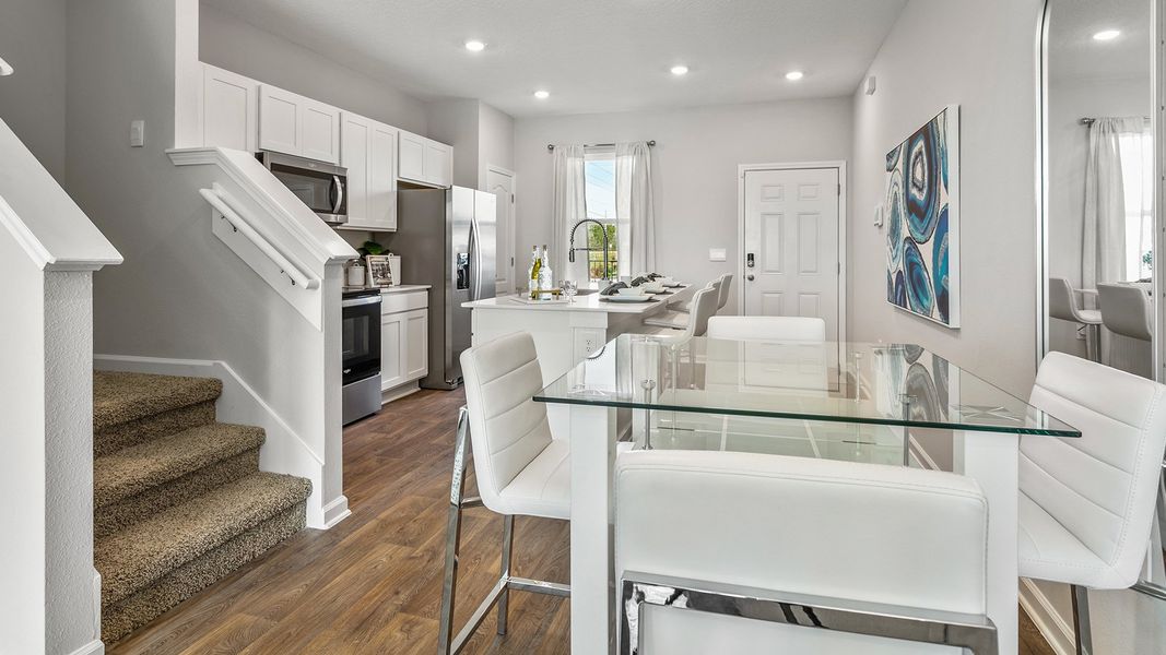 Representative furnished interior of a home built from the Osmond by D.R. Horton in Stokes Landing Express, St. Augustine (Image 8).