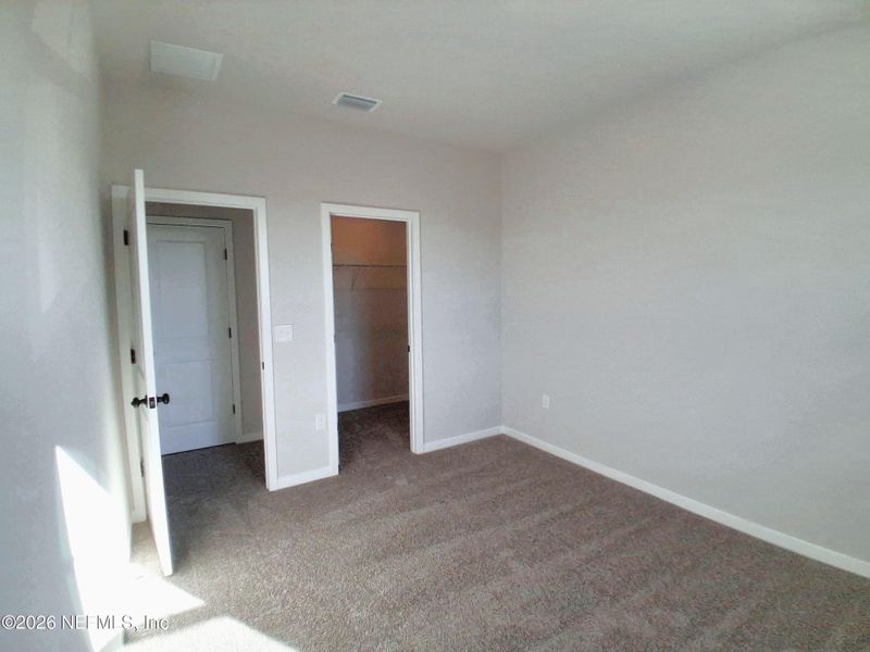 Spacious, unfurnished interior of a new home in Seminole Palms, Palm Coast (Image 22).