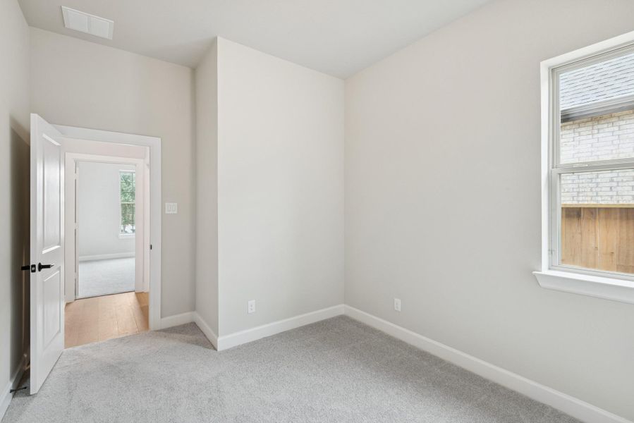 Spacious, unfurnished interior of a new home in Meridiana 55' Homesites, Manvel (Image 19).