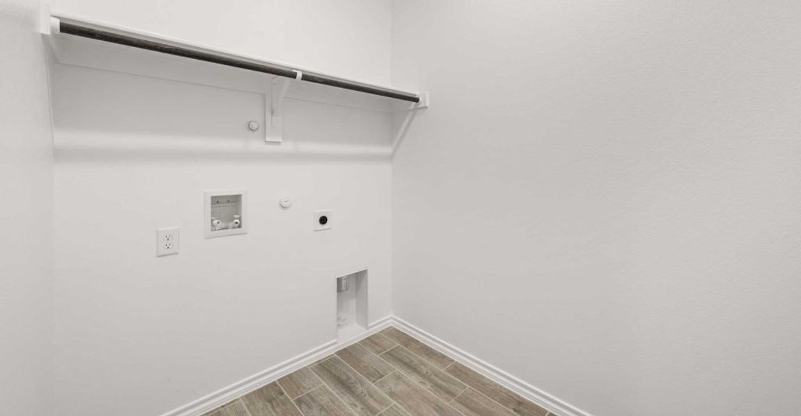 Representative exterior photo of a completed home built from the Dozier by Impression Homes in Redden Farms, Midlothian, TX (Image 25). Representative exterior photo of a completed home built from the Dozier by Impression Homes in Redden Farms, Midlothian, TX (Image 25).