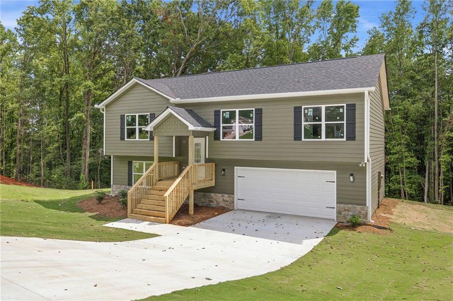 Front exterior of a new home in , Mount Airy, GA, highlighting curb appeal (Image 14).