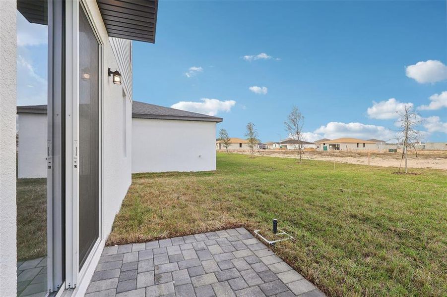 Exterior details and patio area of a home in , Davenport (Image 4).