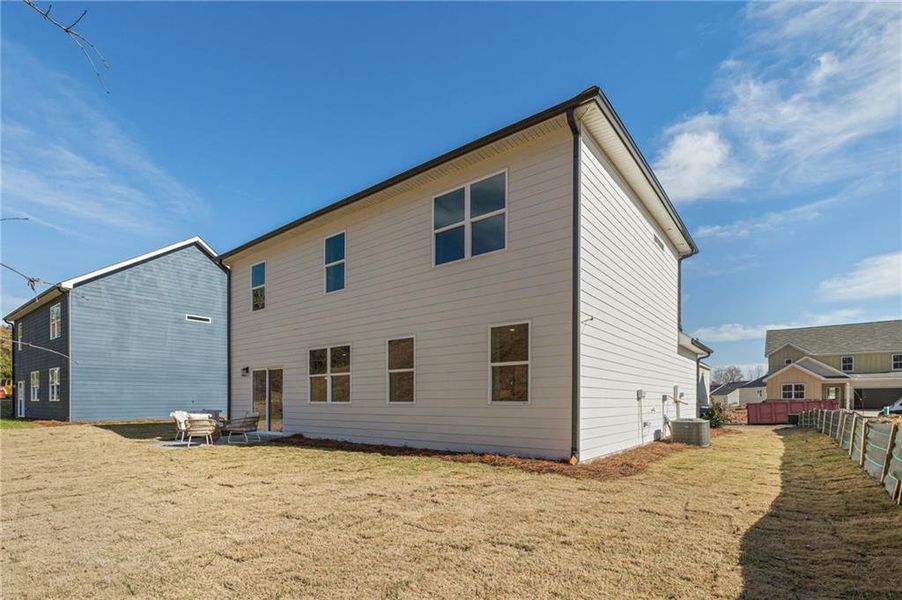 Exterior details and patio area of a home in Ashley Falls, Douglasville (Image 2). Exterior details and patio area of a home in Ashley Falls, Douglasville (Image 2).
