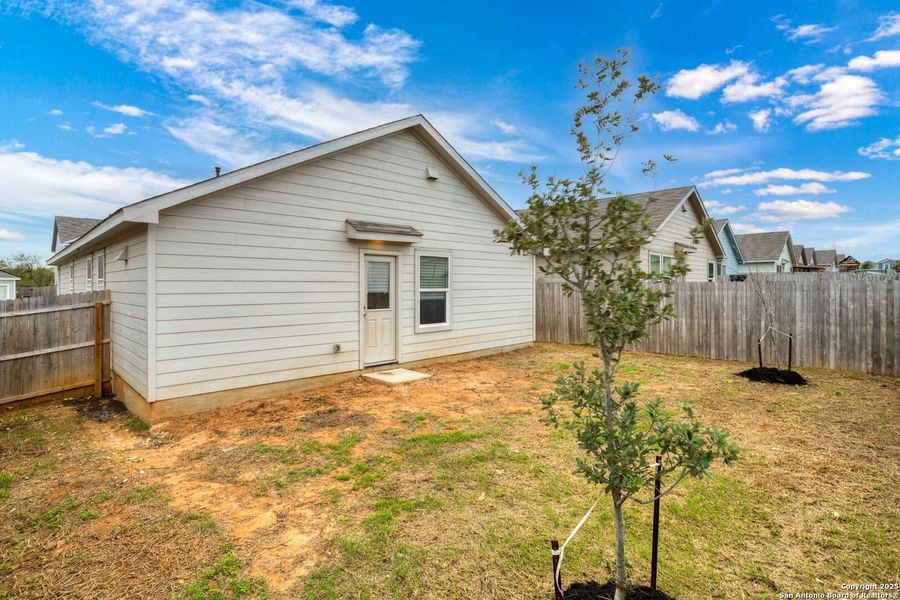 Exterior details and patio area of a home in Ruby Crossing: Cottage Collection, San Antonio (Image 3).