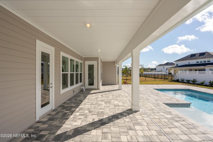 Exterior details and patio area of a home in SilverLeaf, St. Augustine (Image 28).