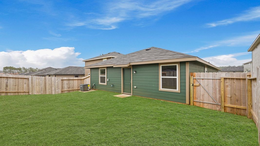 Exterior details and patio area of a home in McCrorey Trails, Conroe (Image 4).