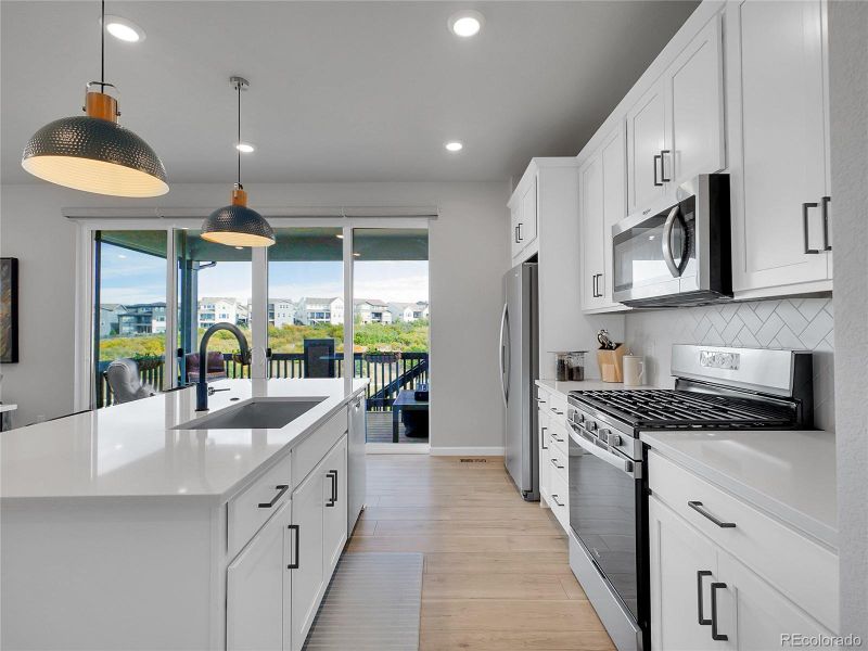 Furnished interior view inside a new home in Wild Oak at The Canyons, Castle Pines (Image 14). Furnished interior view inside a new home in Wild Oak at The Canyons, Castle Pines (Image 14).