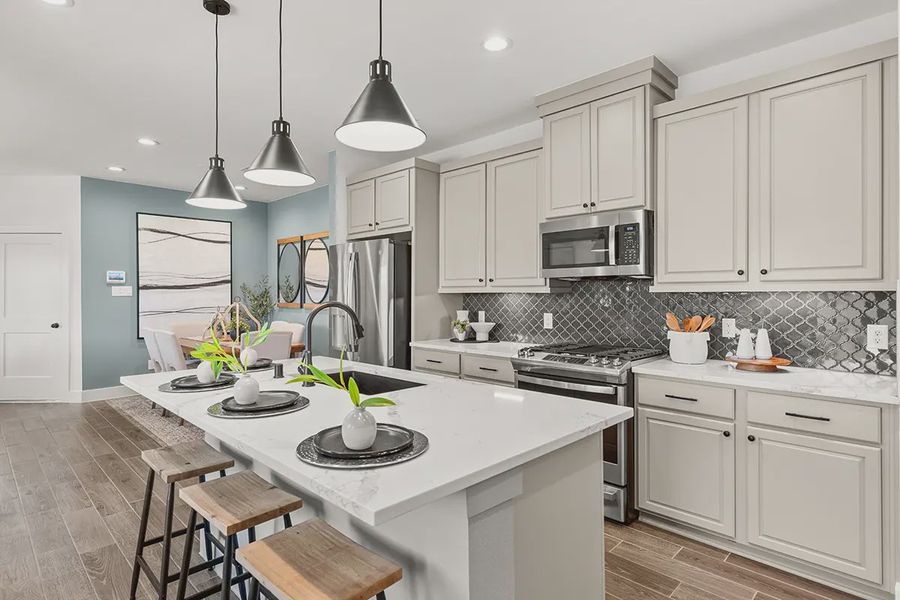 Representative furnished interior of a home built from the Countryside by Chesmar Homes in Meridiana Townhomes, Iowa Colony (Image 8).