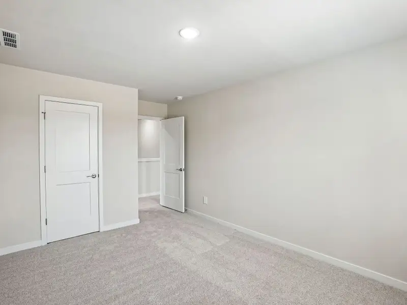 Spacious, unfurnished interior of a new home in Watkins Glen, Raleigh (Image 19).