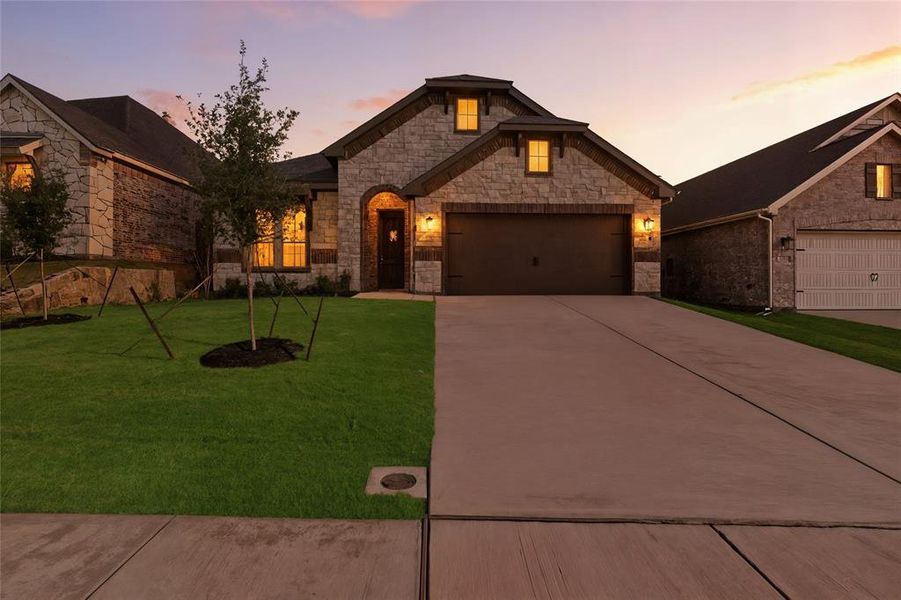 Front exterior of a new home in Waterford Park, Weatherford, TX, highlighting curb appeal (Image 25). Front exterior of a new home in Waterford Park, Weatherford, TX, highlighting curb appeal (Image 25).