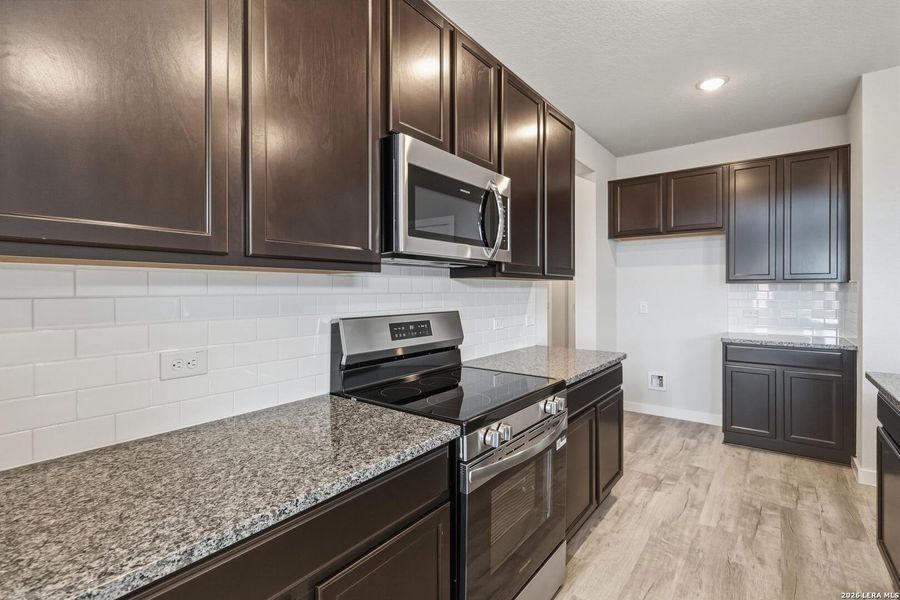 Furnished interior view inside a new home in Red Hawk Landing, San Antonio (Image 9).