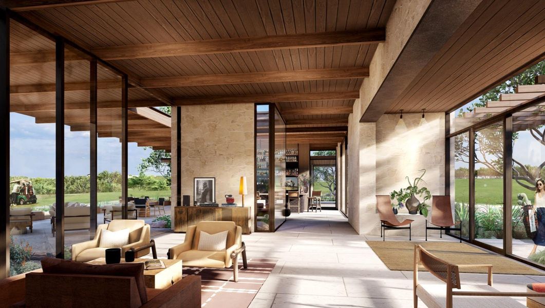 Community lobby with a wall of windows and a wood ceiling with exposed beams