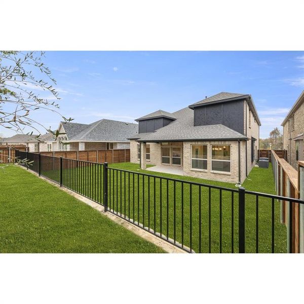 Exterior details and patio area of a home in Solterra, Mesquite (Image 24).