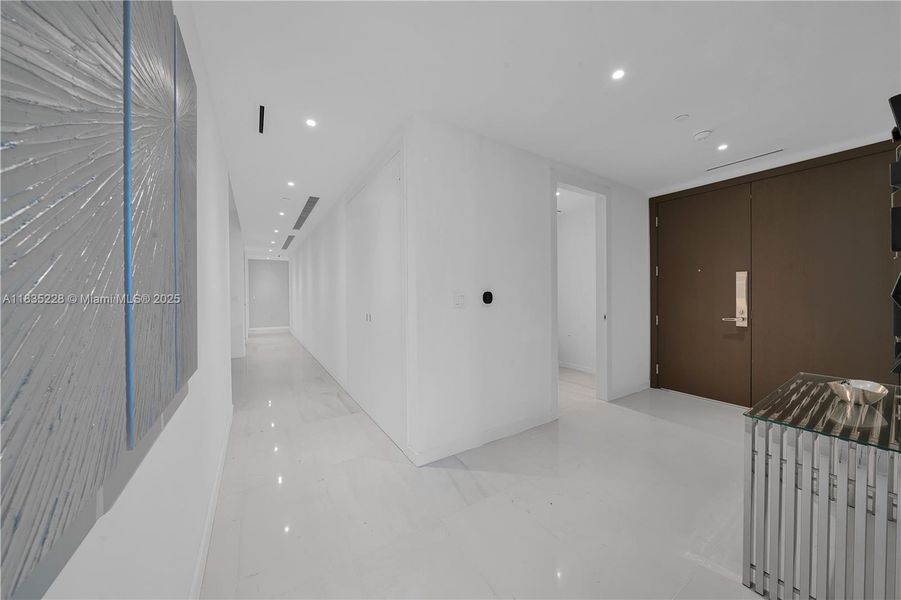 Spacious, unfurnished interior of a new home in Aston Martin Residences, Miami (Image 50).