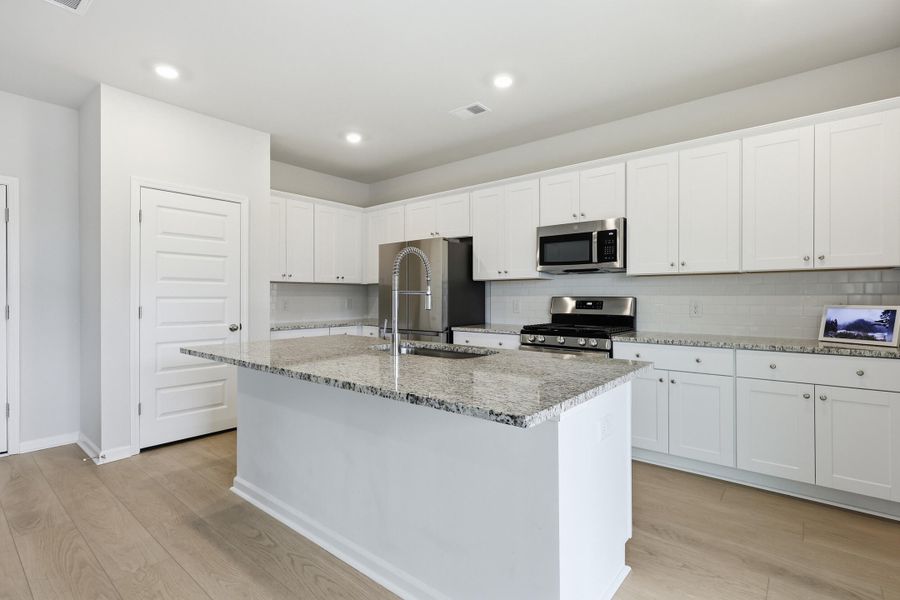 Furnished interior view inside a new home in Sweetgrass at Summers Corner: Carolina Collection, Summerville (Image 17).