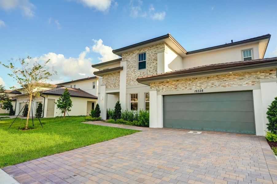 Front exterior of a new home in , Davie, FL, highlighting curb appeal (Image 27).