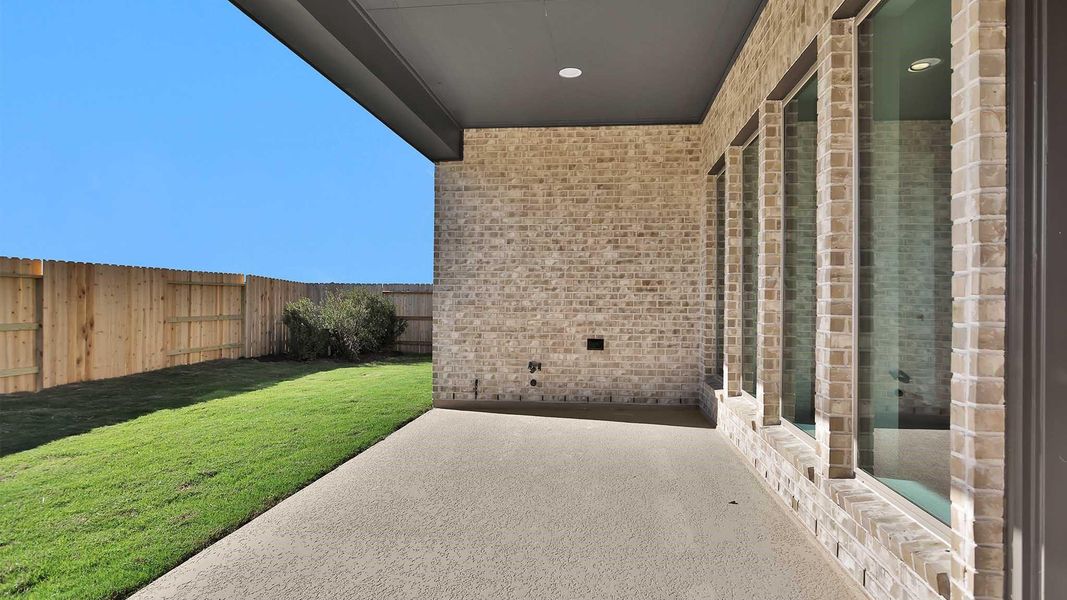 Exterior details and patio area of a home in Stonecreek Estates 50', Richmond (Image 3).