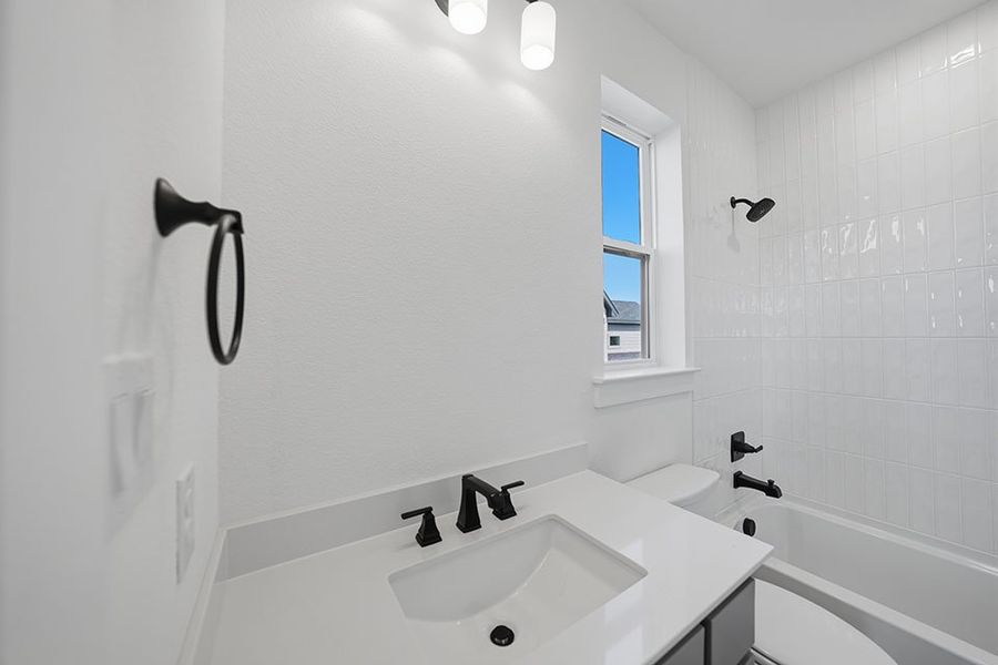 Furnished interior view inside a new home in Light Farms Graham/Reagan, Celina (Image 18).