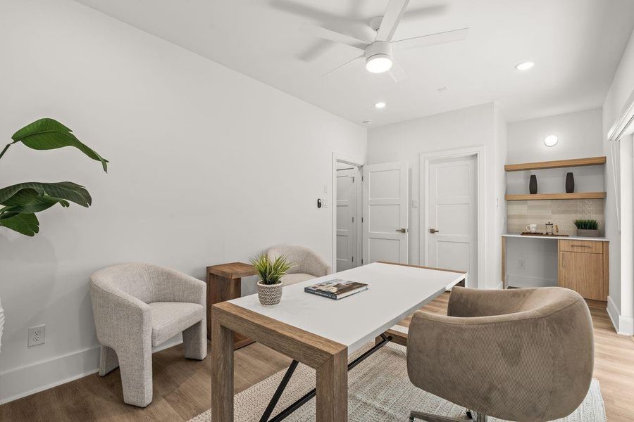 A private first-floor suite with a full ensuite bath offers the flexibility to accommodate guests, create a home office, or adapt to your evolving lifestyle.