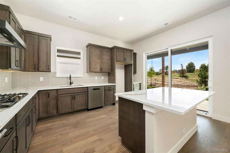 Furnished interior view inside a new home in Pelican Shores at Water Valley, Windsor (Image 8).