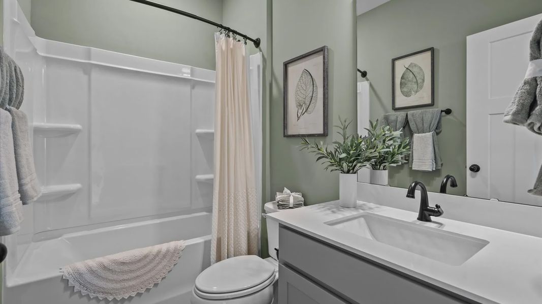 Representative furnished interior of a home built from the Cooper 3 by DRB Homes in Magnolia Park, Woodruff (Image 6).