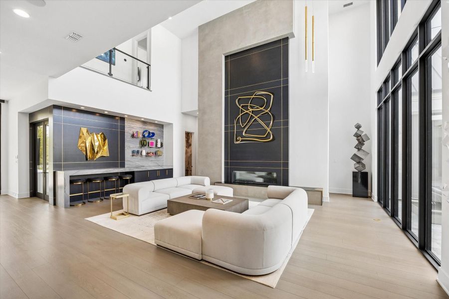 The vast 2 story ceilings in the living room are a wow feature when you walk into the home. The vast 2 story ceilings in the living room are a wow feature when you walk into the home.