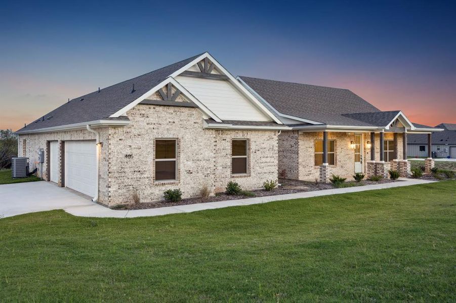 Front exterior of a new home in The Reserve At Brock, Weatherford, TX, highlighting curb appeal (Image 1).