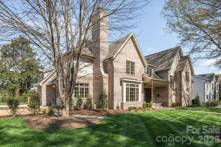 Front exterior of a new home in , Charlotte, NC, highlighting curb appeal (Image 24).