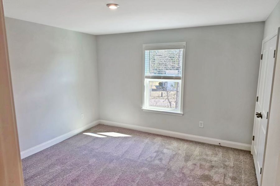 Spacious, unfurnished interior of a new home in Solserra, Shallotte (Image 14).