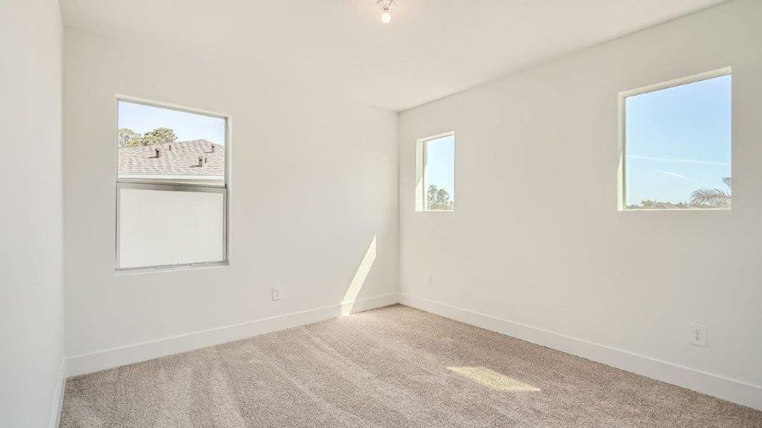 Representative unfurnished interior of a home built from the Ponte Vedra by D.R. Horton in Preserves at Park Trace, Stuart (Image 19).