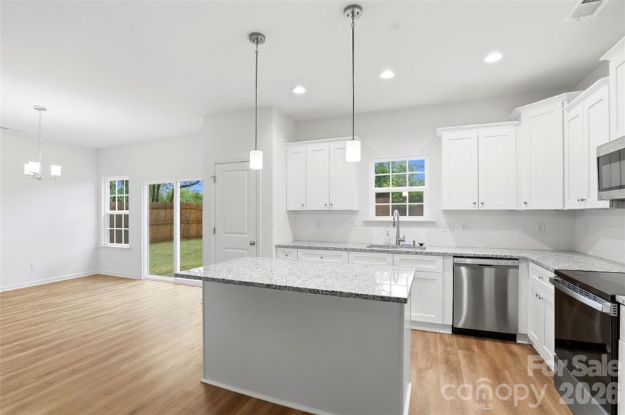 Furnished interior view inside a new home in , Charlotte (Image 4).