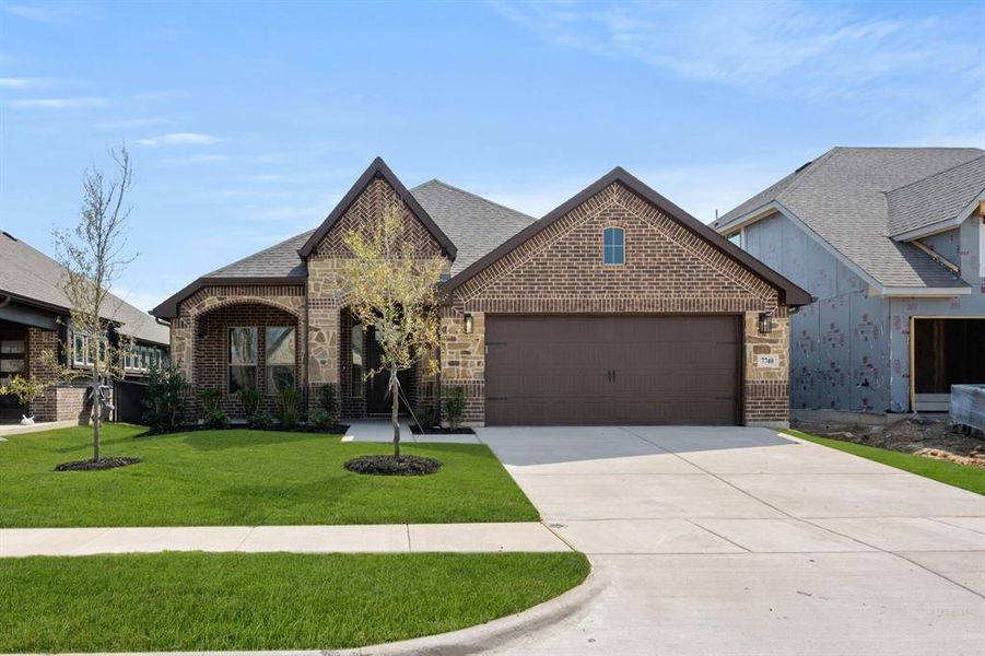 Front exterior of a new home in Silo Mills - Select Series, Joshua, TX, highlighting curb appeal (Image 25).
