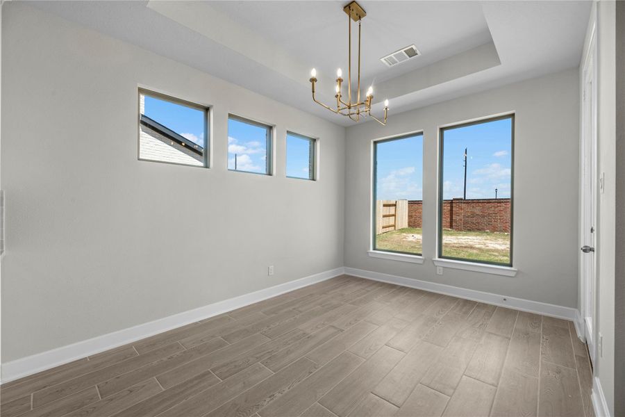 Spacious, unfurnished interior of a new home in Sunterra, Katy (Image 10).