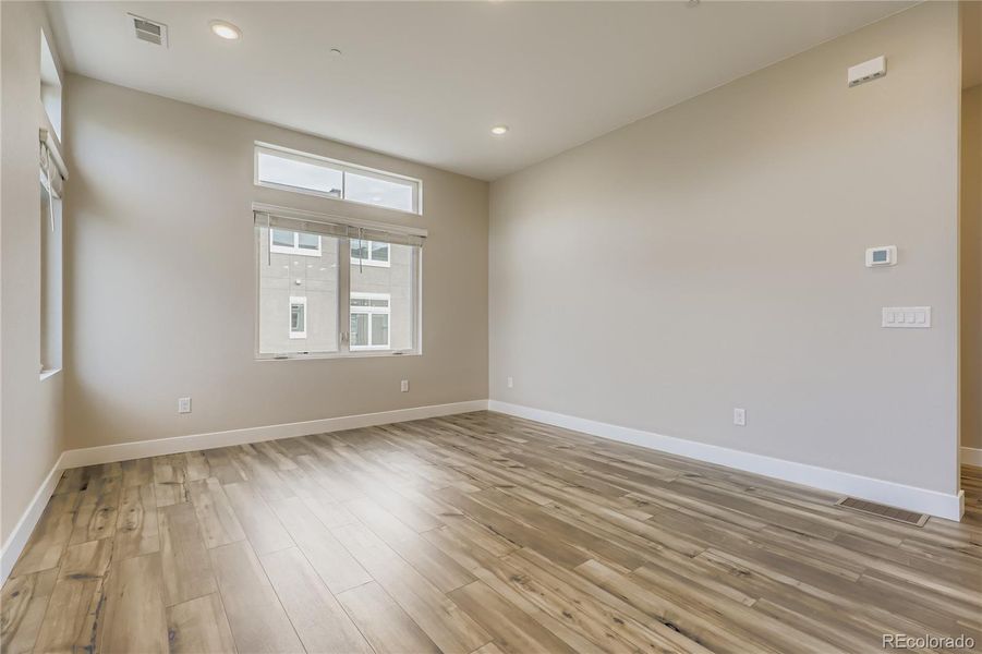 Spacious, unfurnished interior of a new home in Cadence at Solterra, Lakewood (Image 20).